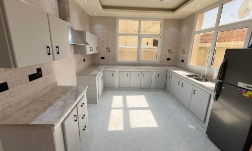 interior look of kitchen after a complete kitchen cabinet vinyl wrapping work